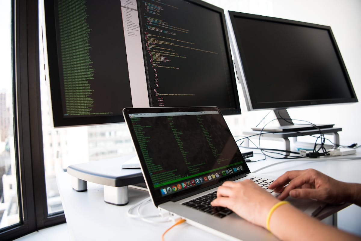 Developer reviewing code at desk